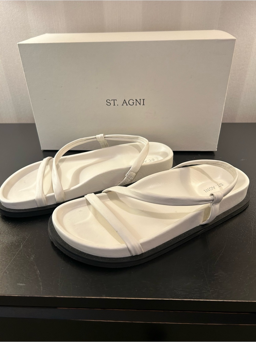 ST. AGNI White Strappy Twist Sandals with Black Sole